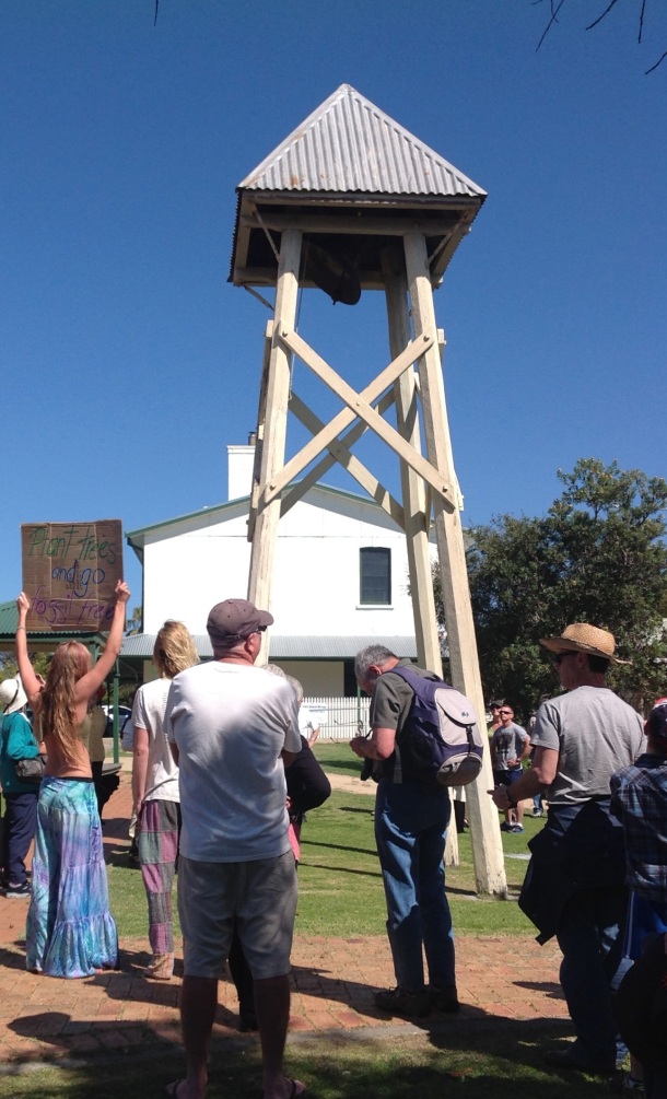 Ringing the Church Bell and celebrating the Anglican Church divesting its fossil fuel holdings at the Moruya Climate Action Picnic